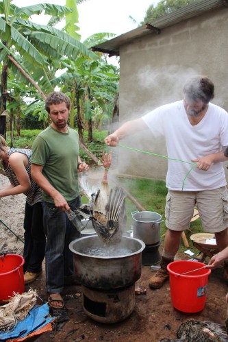 Searing the turkeys so we can pluck them easily.
